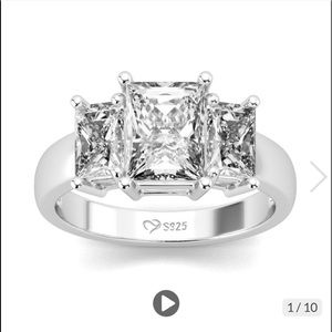 Sterling Silver CZ 3 stone engagement ring.  Never worn, size 7.